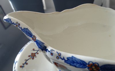 Gien factory. Earthenware sauce boat, Rooster and Peony model. Stamp from the 1930s-1960s.