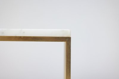 Pair of marble and gilt bronze end tables. 1970s. LS6309409P