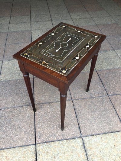 A small Louis XVI mahogany side table with an oriental-style top