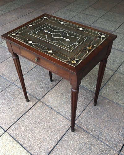 A small Louis XVI mahogany side table with an oriental-style top