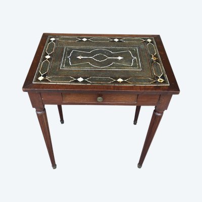 A small Louis XVI mahogany side table with an oriental-style top