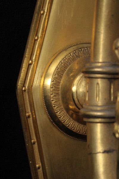 Empire wall lamp in gilded and patinated bronze with Fame, 19th century