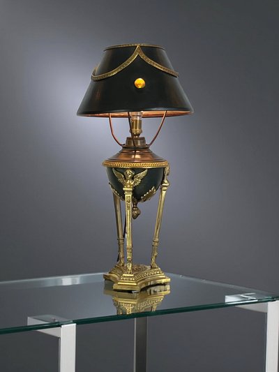 ANTIQUE EMPIRE STYLE LAMP IN BRONZE AND BRASS WITH DECORATED SHEET METAL LAMPSHADE