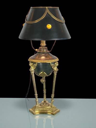 ANTIQUE EMPIRE STYLE LAMP IN BRONZE AND BRASS WITH DECORATED SHEET METAL LAMPSHADE
