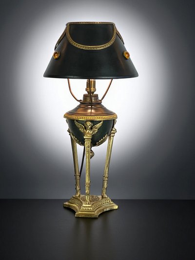 ANTIQUE EMPIRE STYLE LAMP IN BRONZE AND BRASS WITH DECORATED SHEET METAL LAMPSHADE