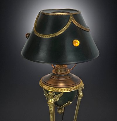 ANTIQUE EMPIRE STYLE LAMP IN BRONZE AND BRASS WITH DECORATED SHEET METAL LAMPSHADE