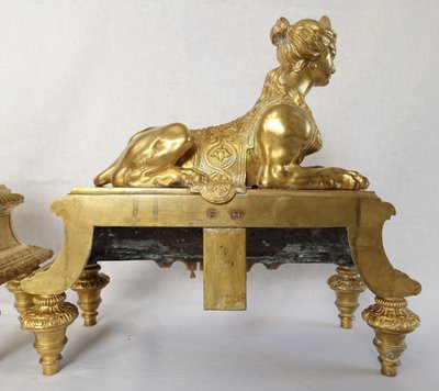 Pair of monumental andirons with Sphinxes, chiseled and gilded bronze - Regency style, Napoleon III period