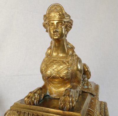 Pair of monumental andirons with Sphinxes, chiseled and gilded bronze - Regency style, Napoleon III period