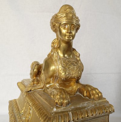 Pair of monumental andirons with Sphinxes, chiseled and gilded bronze - Regency style, Napoleon III period