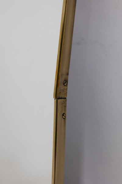 Coppia di specchi in ottone dorato. Circa 1970. LS63611176B