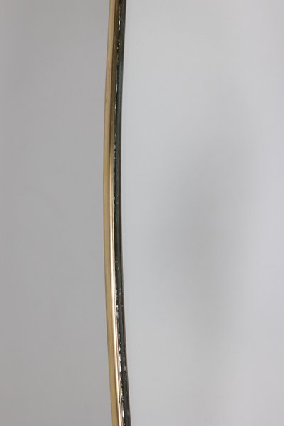 Coppia di specchi in ottone dorato. Circa 1970. LS63611176B