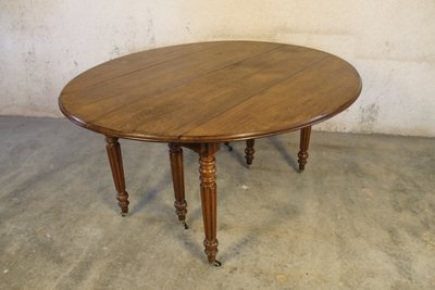 Table à 6 pieds en chêne de forme ovale avec 4 allonges époque milieu 19ème 