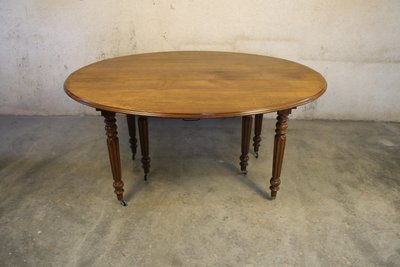 Table à 6 pieds en chêne de forme ovale avec 4 allonges époque milieu 19ème 