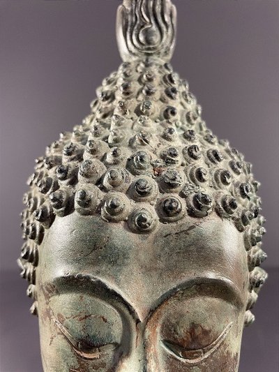 Thailand, Sukhothai, 1950s/1960s, Bronze Buddha Head Presented on a Pedestal.