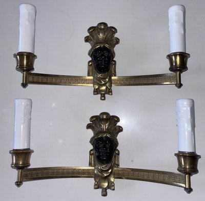 BAGUES House, Indian (or Nubian) wall lights in gilded and patinated bronze