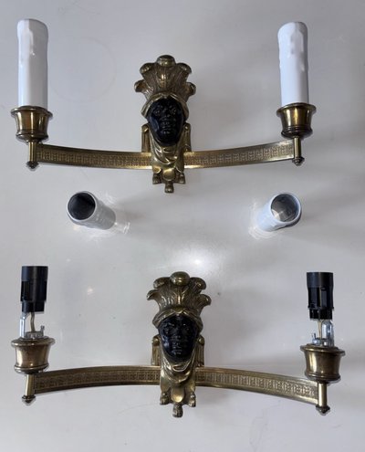 BAGUES House, Indian (or Nubian) wall lights in gilded and patinated bronze
