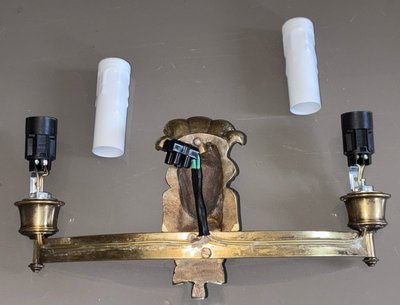 BAGUES House, Indian (or Nubian) wall lights in gilded and patinated bronze