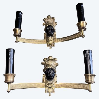 BAGUES House, Indian (or Nubian) wall lights in gilded and patinated bronze