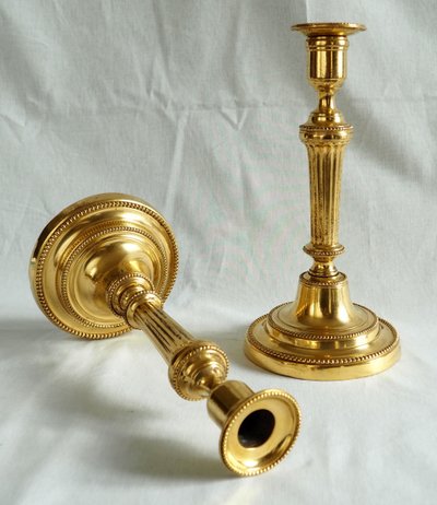 Coppia di candelieri/torce in bronzo dorato al mercurio, epoca Luigi XVI - XVIII secolo