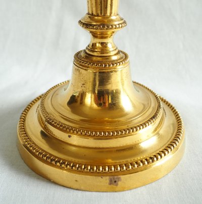 Coppia di candelieri/torce in bronzo dorato al mercurio, epoca Luigi XVI - XVIII secolo