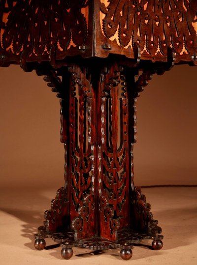 Amsterdam School, 1900-1920. Very impressive and elegant openwork wooden table lamp.
