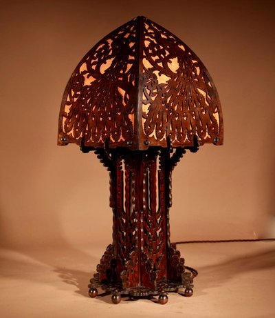 Amsterdam School, 1900-1920. Very impressive and elegant openwork wooden table lamp.