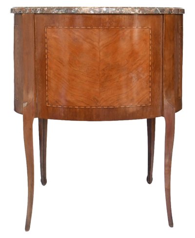 Petite commode de forme rognon de style Transition 