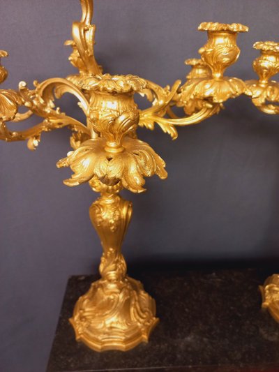 Large pair of Louis XV style candelabras in gilded and chiseled bronze