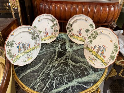 FOUR PLATES OF MILAN EARTHENWARE MANUFACTURED BY FELICE CLERICI 18TH CENTURY
