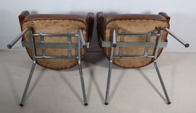 Pair of 50s-60s leatherette armchairs