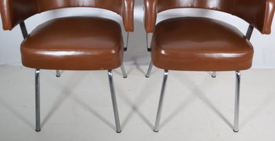 Pair of 50s-60s leatherette armchairs
