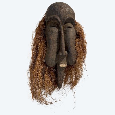Masque Africain en bois sculpté et raffia 
