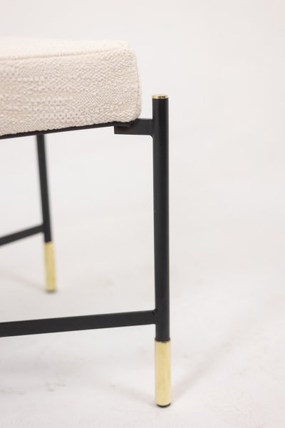 Pair of white benches, in lacquered and gold metal. 2000s. LS6364756M