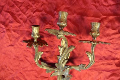 Pair of Louis XV style bronze 3-light wall lights, early 20th century height: 46 cm