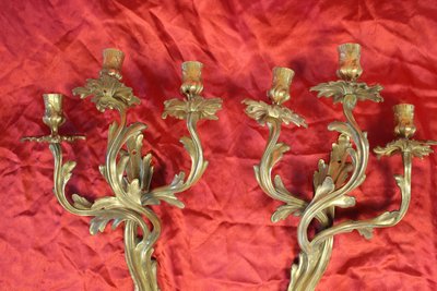 Pair of Louis XV style bronze 3-light wall lights, early 20th century height: 46 cm