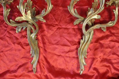 Pair of Louis XV style bronze 3-light wall lights, early 20th century height: 46 cm
