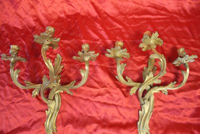 Pair of bronze sconces with 3 light arms in the Louis XV style, 19th century h: 45 cm
