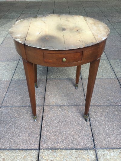 A pedestal table called a "bouillotte table"