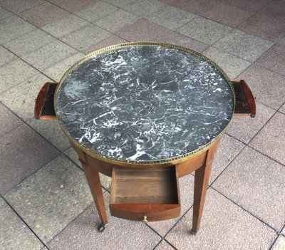 A pedestal table called a "bouillotte table"