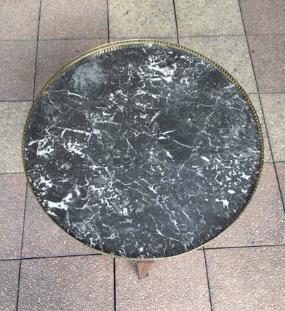 A pedestal table called a "bouillotte table"