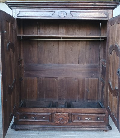 Louis XIV wardrobe in solid oak, 18th century