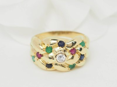 Bague jonc en or jaune et pierres précieuses 