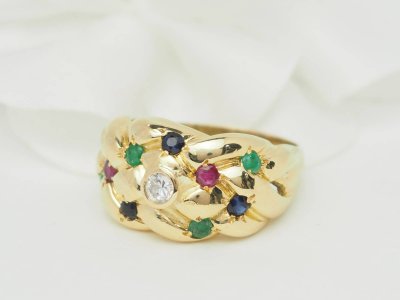 Bague jonc en or jaune et pierres précieuses 