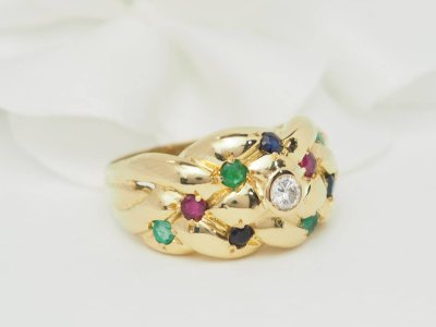 Bague jonc en or jaune et pierres précieuses 