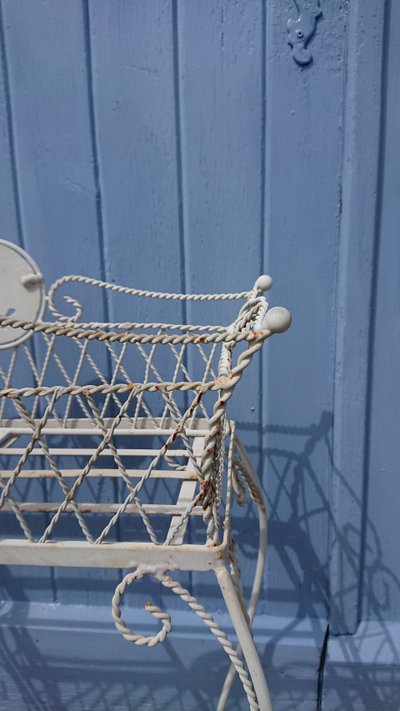 Planter on wrought-iron legs