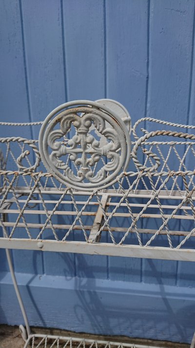 Planter on wrought-iron legs