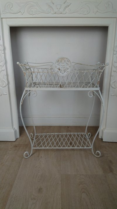 Planter on wrought-iron legs
