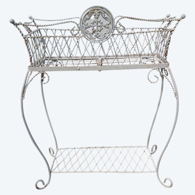 Planter on wrought-iron legs