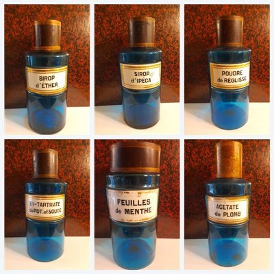6 blue glass apothecary jars
