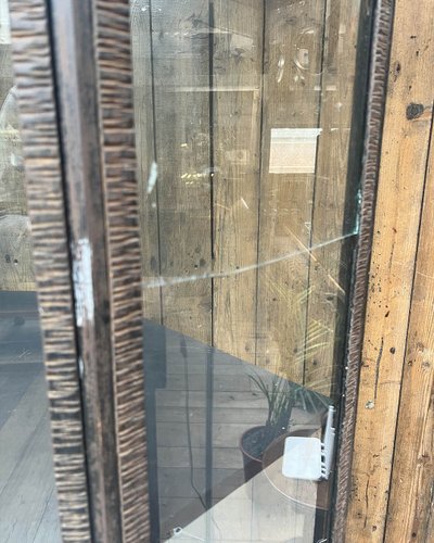 Hammered iron display cabinet